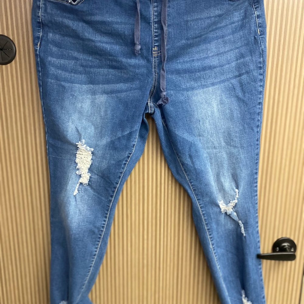 Distressed Blue Denim Jeans